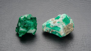 Raw Muzo and Chivor emeralds by GIA Robert Weldon